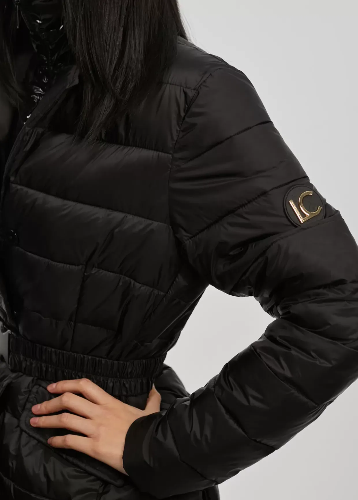 Chaqueta acolchada con cinturón