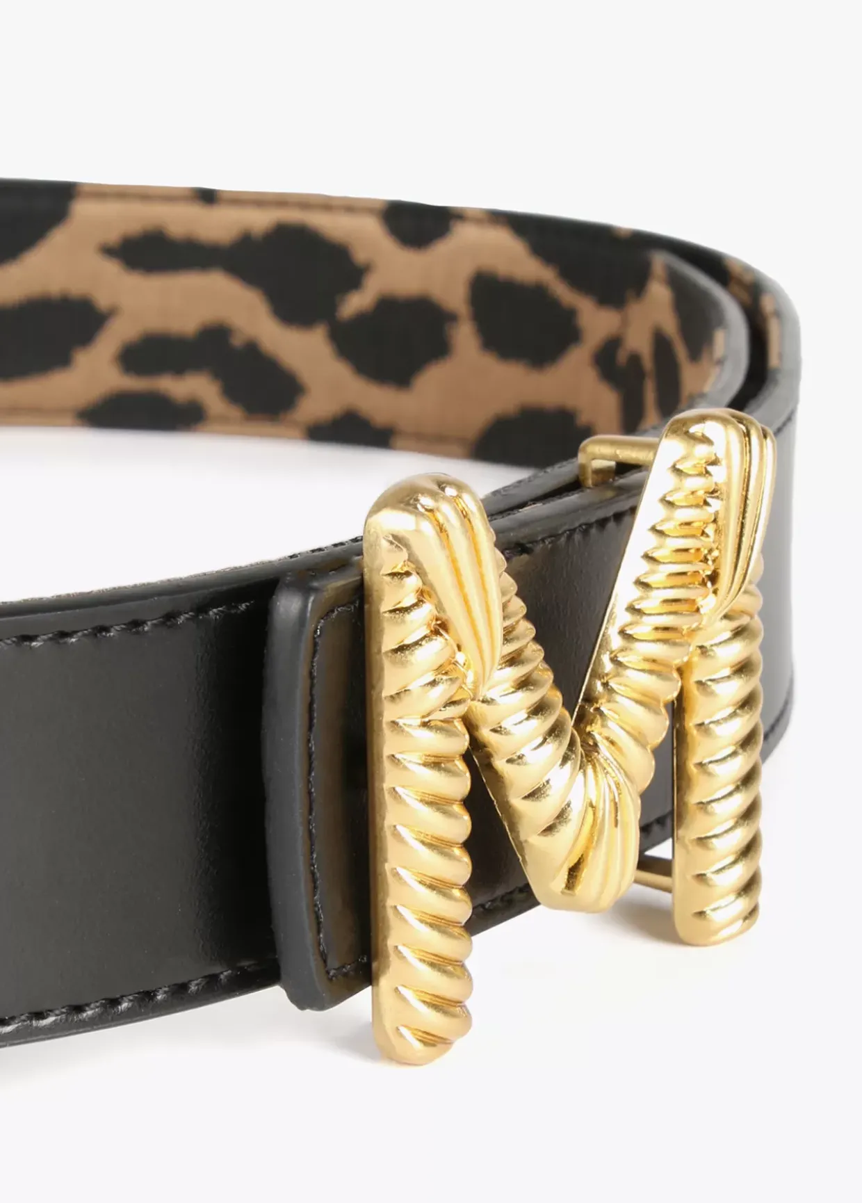 Cinturón reversible estampado animal y negro