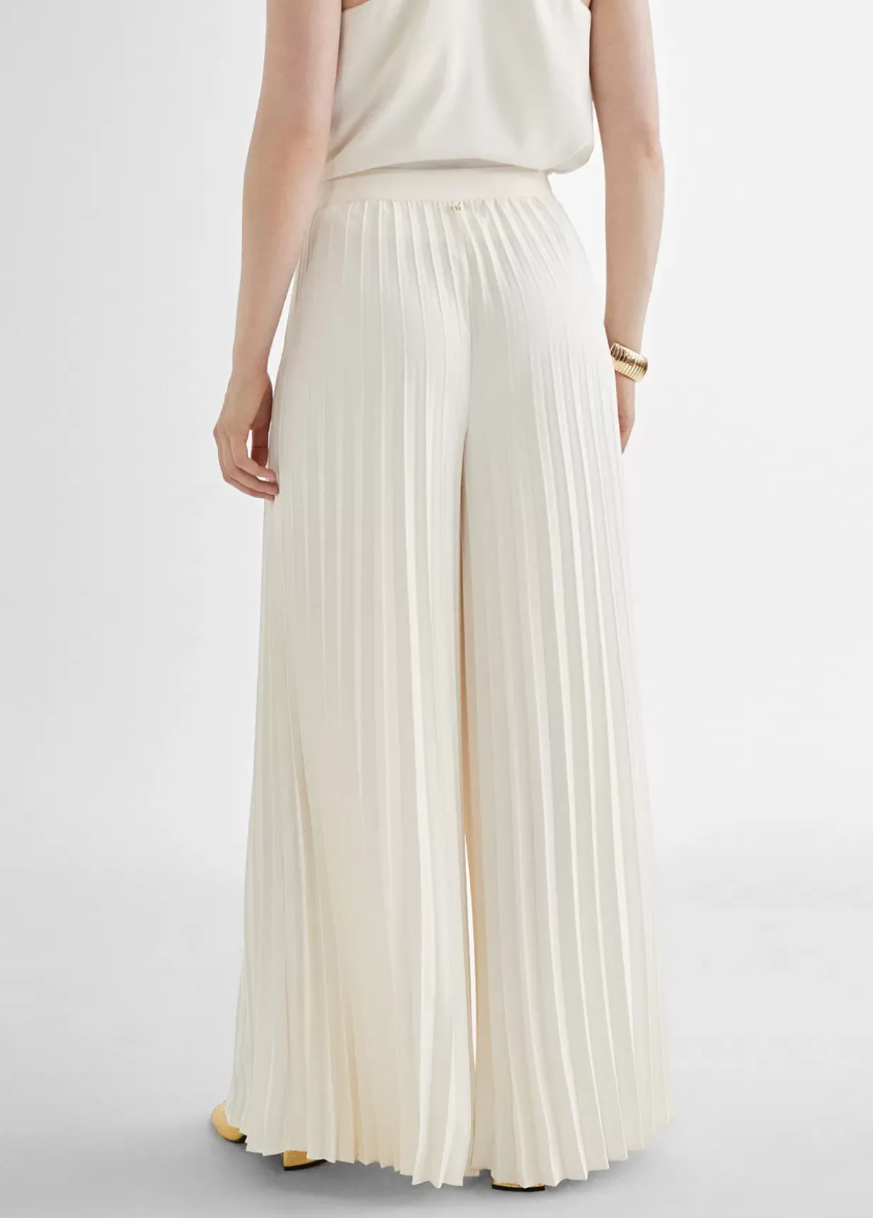 Pantalón plisado y fluído