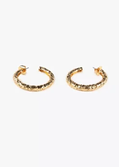 Pendientes dorados con textura