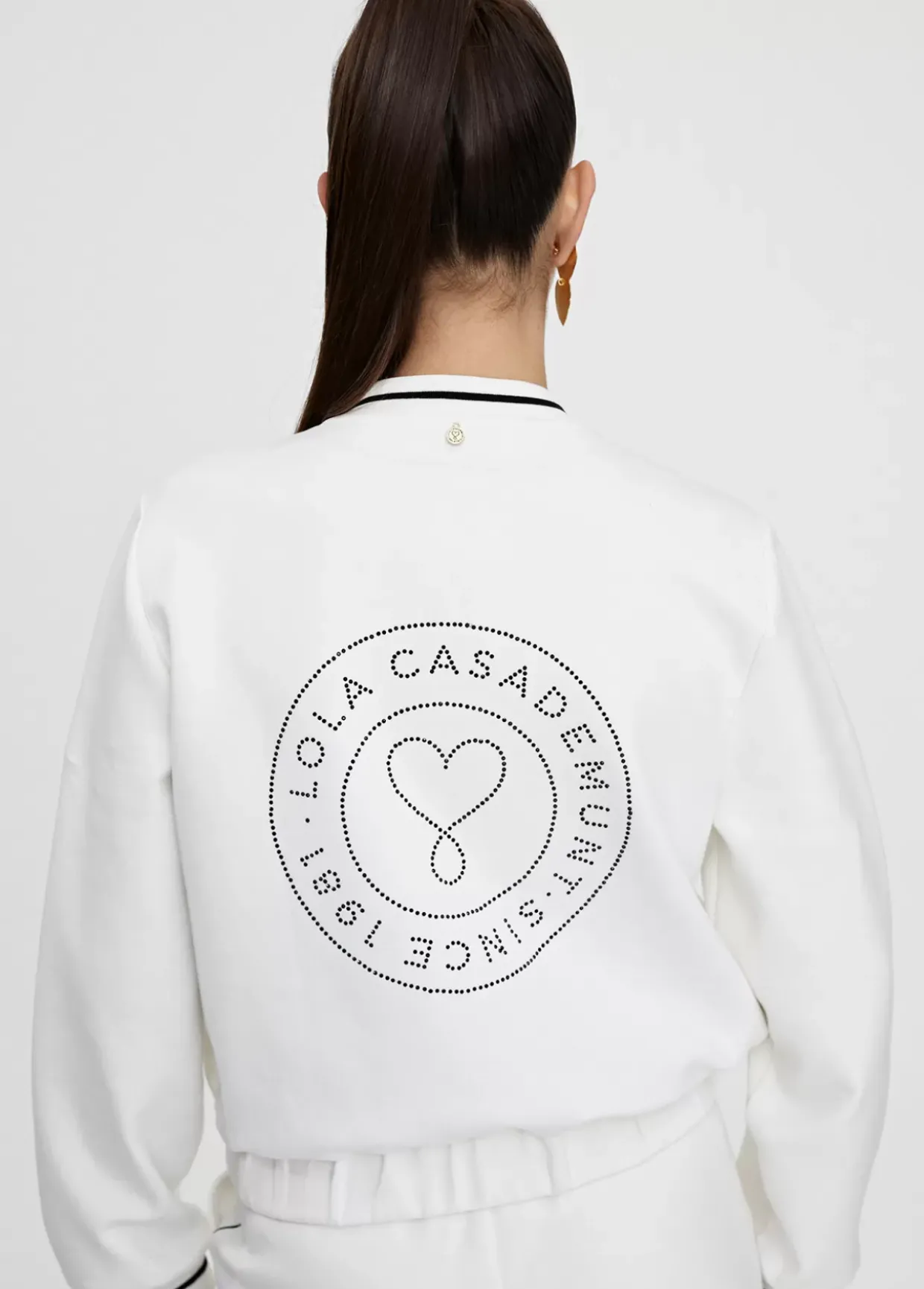 Sudadera cremallera con lentejuelas