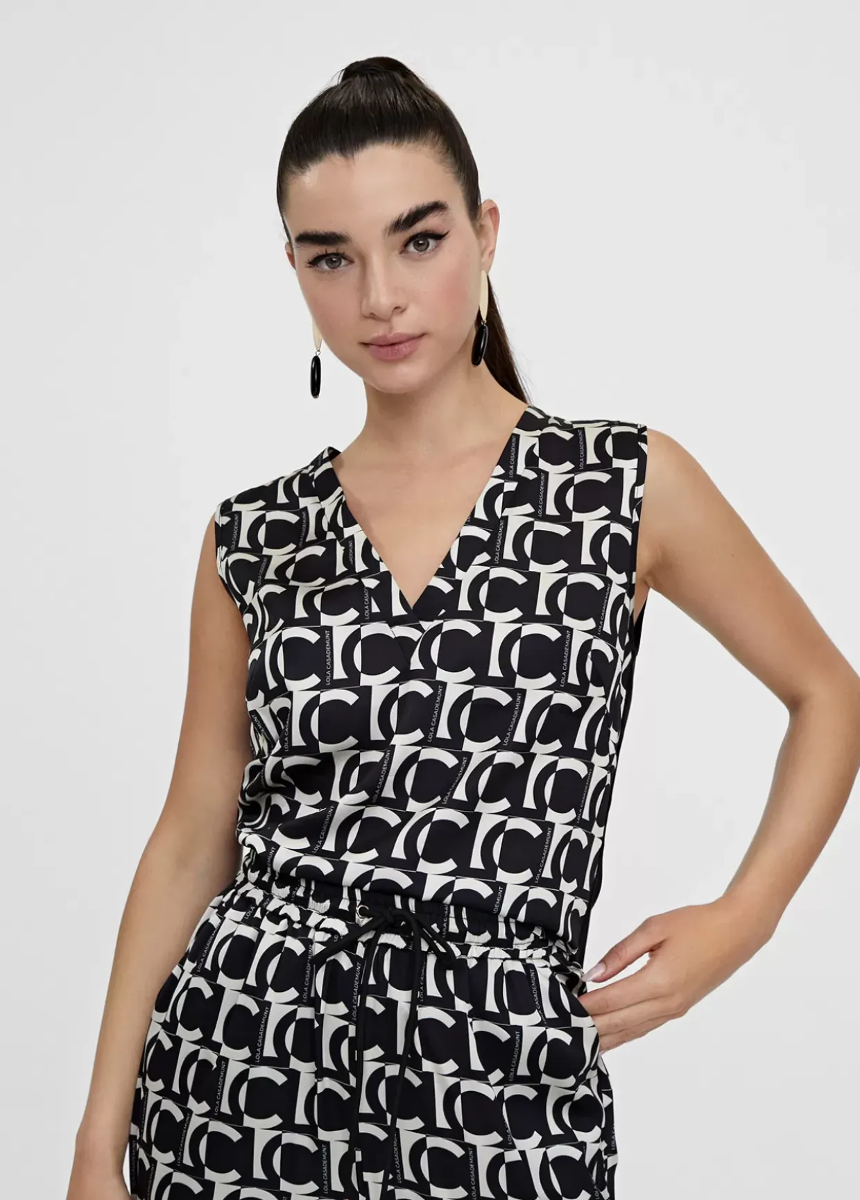 Top fluido monograma